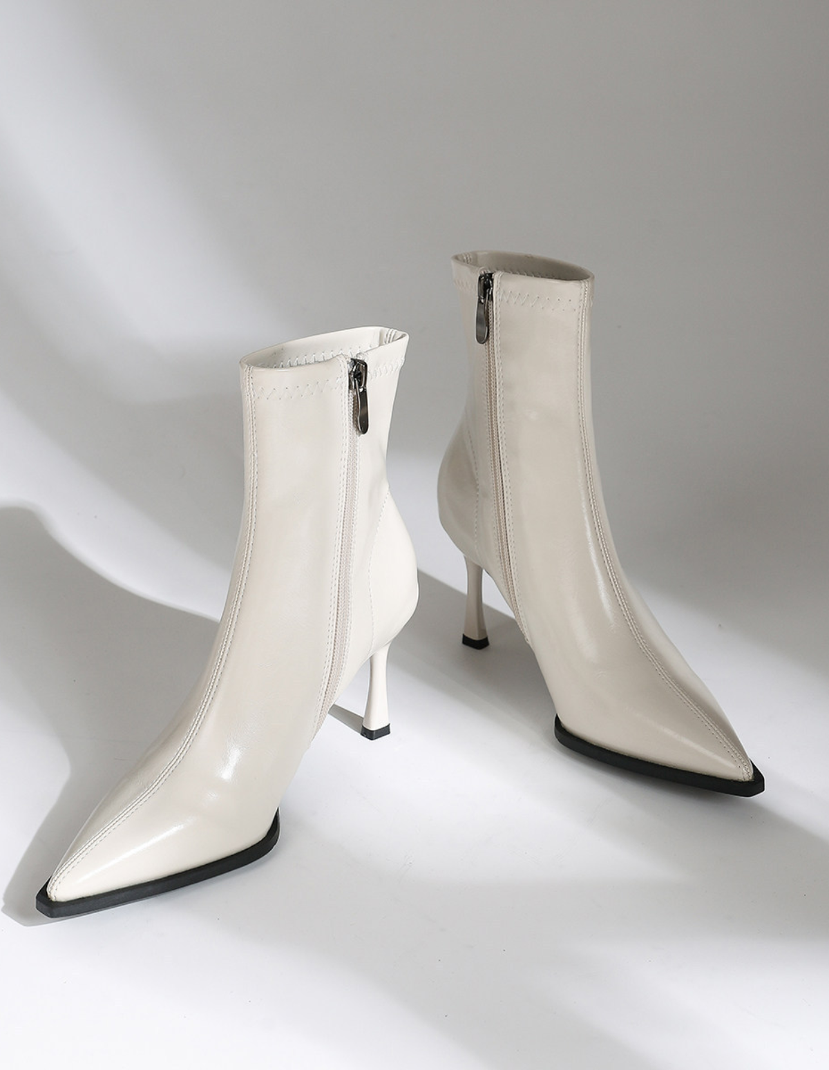 The Celmira Pointed Ankle Boots