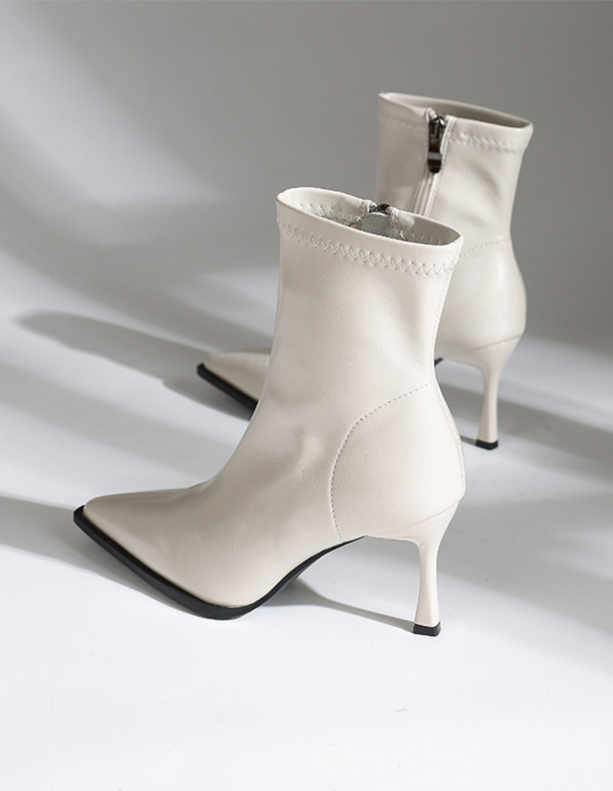 The Celmira Pointed Ankle Boots